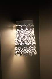 When lighting up your space, don't forget the walls. Remodelaholic Easy Ikea Hack Cordless Wall Lamps From Plant Pots