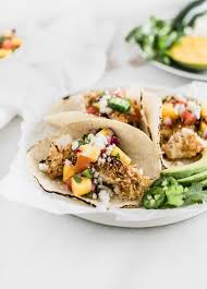 The mighty fish taco is one of the best foods in the universe. Healthy Coconut Fish Tacos With Mango Salsa Lively Table