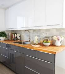 Samantha Pynn Turns A Below Ground Apartment Into A Polished European Style Kitchen Find Out She C Glossy Kitchen Kitchen Inspirations Gloss Kitchen Cabinets