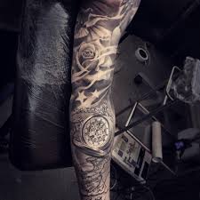 Red rose and dagger tattoo male forearms. Sleeve Tattoo Stars Roses Dove Star Tattoos Star Sleeve Tattoo Sleeve Tattoos