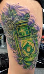 Flaming green lantern logo tattoo on wrist. 40 Traditional Lantern Tattoos