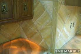 We stock onyx tiles, mosaics, sinks, tubs, slabs, vanities, and custom products. Light Green Onyx
