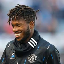 Bring A Football Player Who Always Smiling.