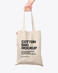 Download Cotton Bag In A Hand Mockup In 2020 Bag Mockup Cotton Bag Clothing Mockup PSD Mockup Templates