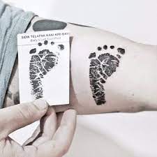 It is a great way to showcase the eternal bond between the mother and child. Baby Footprint Tattoos Popsugar Family