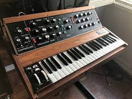 Moog Minimoog Model D Walnut Limited Edition Reissue 2018 Walnut The Official Awesome Reverb Shop Reverb Moog Guitar Tech The Originals