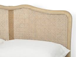 The decorative finials are finished in silver leaf, with the white finish perfect to showcase bedding. Margot Bed Rattan French Bed Loaf