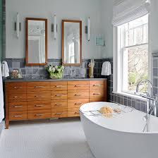 The wood trim around the white cabinets also adds texture and depth to the area. Bathroom Cabinet Ideas Better Homes Gardens
