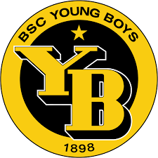 Teenage boy with shoulder length hair, shirtless, wearing blue jeans and black sneakers. Bsc Young Boys Wikipedia
