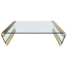 Is a masterpiece of modern design. Modern Glass And Brass Waterfall Coffee Table For Sale At 1stdibs