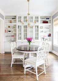 Dining table size compared to rug size. White Bamboo Chairs At White And Brown Oval Dining Table Transitional Dining Room