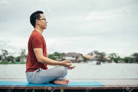 Yoga class early morning near me. Asian Man Playing With A Yoga School At Yoga Class In Early Morning Lifestyle And Healty Concept Stock Photo Picture And Royalty Free Image Image 100930495