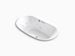 Its shape means it can be filled with less water. K 5718 Jh Underscore Oval 72 Heated Whirlpool Bath Kohler