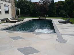 Infinity & wet edge, spas & hot tubs, stepping stones, travertine. Hendricks Pools Gallery