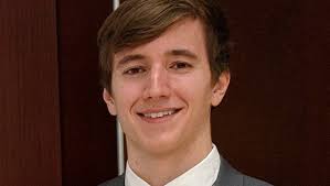 Jonathon Blank graduates summa cum laude