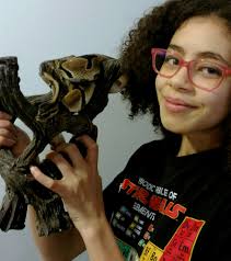 There was no pulling this rock out from the tree wrapping itself around  like a python