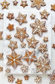 Royal Icing Topped Gingerbread Star And Snowflake Biscuits Gingerbread Cookies Decorated Gingerbread Cookies Xmas Cookies