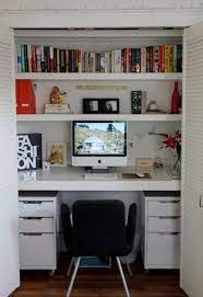 Learn how to turn a closet into a stylish and functional office space! Symmetrical White Closet Office Home Office Closet Guest Room Office Small Home Office Desk