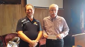 Lindsay presents $5000 to Jim McCammon from Forests Without Borders