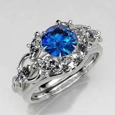 Elvish Engagement Ring Set With Lab Sapphire Elven Fantasy Etsy Wedding Ring Sets Wedding Ring Stores Wedding Rings
