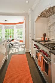 white and orange kitchen contemporary