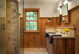 Rich wood paneling warms up the room and flows across the face of the vanity. Bathroom With Wainscoting Design Ideas Small Design Ideas