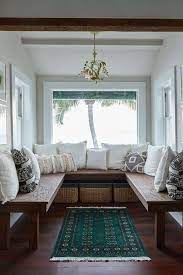 Robin's egg blue trim and seating complements the greenery that peeks in from the lush backyard. 20 Cozy Window Seat Ideas Inspiring Seating For Any Home