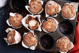 Moist Tender Carrot Muffins With Soft Sweet Cream Cheese Filling Carrot Cake Muffins Carrot Cake Muffin Recipe Recipes