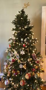 How to put tinsel garland on a christmas tree. The 2020 Christmas Tree Just Left Awkward Suddenly Approaching Old