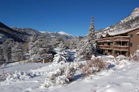 A popular summer resort and the location of the headquarters for rocky mountain national park, estes park lies along the big thompson river. Estes Park Wildwood Inn Luxurious Cabins Suites Vacation Homes