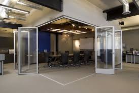 Sliding Doors Create An Open Corner Conference Room Conference Room Design Office Interior Design Blue Office