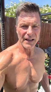 Clark Bartram Sitting Arms Raised