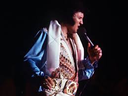 What year did Elvis Presley die and how old was he?
