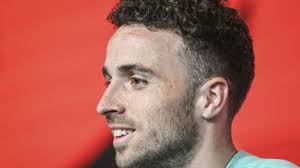 Startimes CEO Hanson Wang and SJAK Chris Mbaisi witnessed by Paul Bitok  Coach display documents Caps