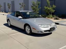 Image result for Bright Red 2001 Saturn