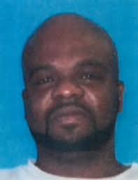 Man wanted for shooting car with man, woman and child inside