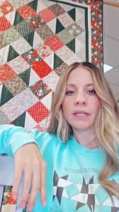 Simply Serene is one of our featured quilts for Christmas in July. The  pillow says "JOY" 😉, #valleyfabricshop #quiltsofinstagram #quiltshop  #fabricsale #christmasquilt #christmasinjuly