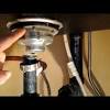 If the stopper is stuck and simply pulling it does not remove it. 1