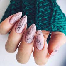 Long almond nails are feminine and can be styled however you like! Stylish Belles Cute Spring Color Almond Nails With Leaves On