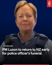 Prime Minister Christopher Luxon is cutting his trip to the United Arab  Emirates short and will be back in New Zealand to attend Senior Sergeant Lyn  Fleming's funeral