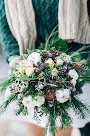 Great for a groom, groomsmen, father and grandfather. A Winter Nordic Wedding Bouquet With Evergreens Berries Cotton Pinecones And Neutral Blooms For Nordic Wedding Winter Wedding Bouquet Winter Wedding Flowers
