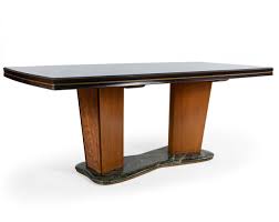 A maple table is ideal for those who are seeking a look that's both modern and timeless. Italian Walnut And Maple Dining Table