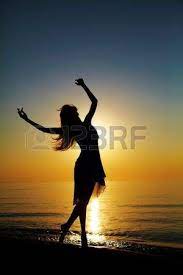Girl Dances On The Beach At Sunset Natural Light And Dark Stock Photo Silhouette Photos Silouette Photography Silhouette Photography