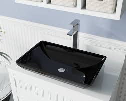 Install bathroom sink above the counter to save space and bring contemporary look. 640 Black Colored Glass Vessel Bathroom Sink
