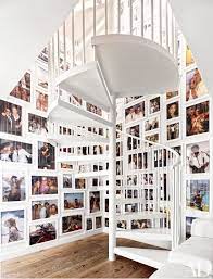 Laying out your photo wall with paper templates. 16 Photo Display Ideas For Family Pictures Architectural Digest