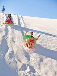 At the visitor's center you can rent a saucer sled to ride down the dunes. White Sands New Mexico Splurgefrugal Com