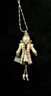 French Doll Pendant Doll Necklace British Style Classic Tan And Plaid Trench Coat Ellie S Belles Pippa French Dolls Doll Jewelry Classic Tan