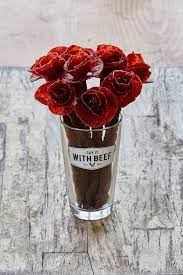 Approximately one year after manly man beef jerky bouquets were born, stemless maple candied bacon jerky rose bouquets were launched. A Poet Once Said We Taste The Fragrance Of The Rose We Ll Do You One Better Beef Jerky Roses Beef Jerky Bouquet Beef Jerky