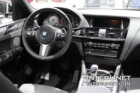 If you were to have asked us what we were looking at, we wouldn't have said a red crossover or used bmw's own vernacular and told you. 2017 Bmw X4 M40i Interunet