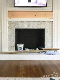 Its important to know were the tiles will go before you start. How To Tile A Brick Fireplace Jenna Kate At Home